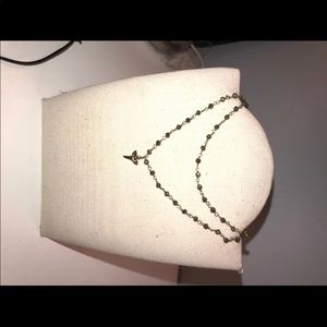 gold shark tooth beaded necklace